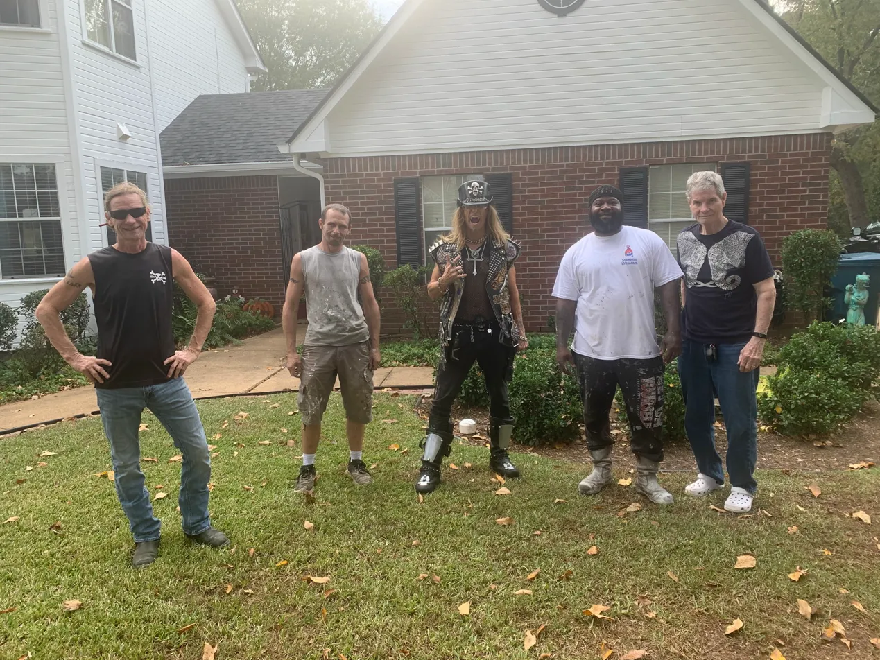 JC PAINTING & CO LLC crew with a Shreveport homeowner at a completed residential job